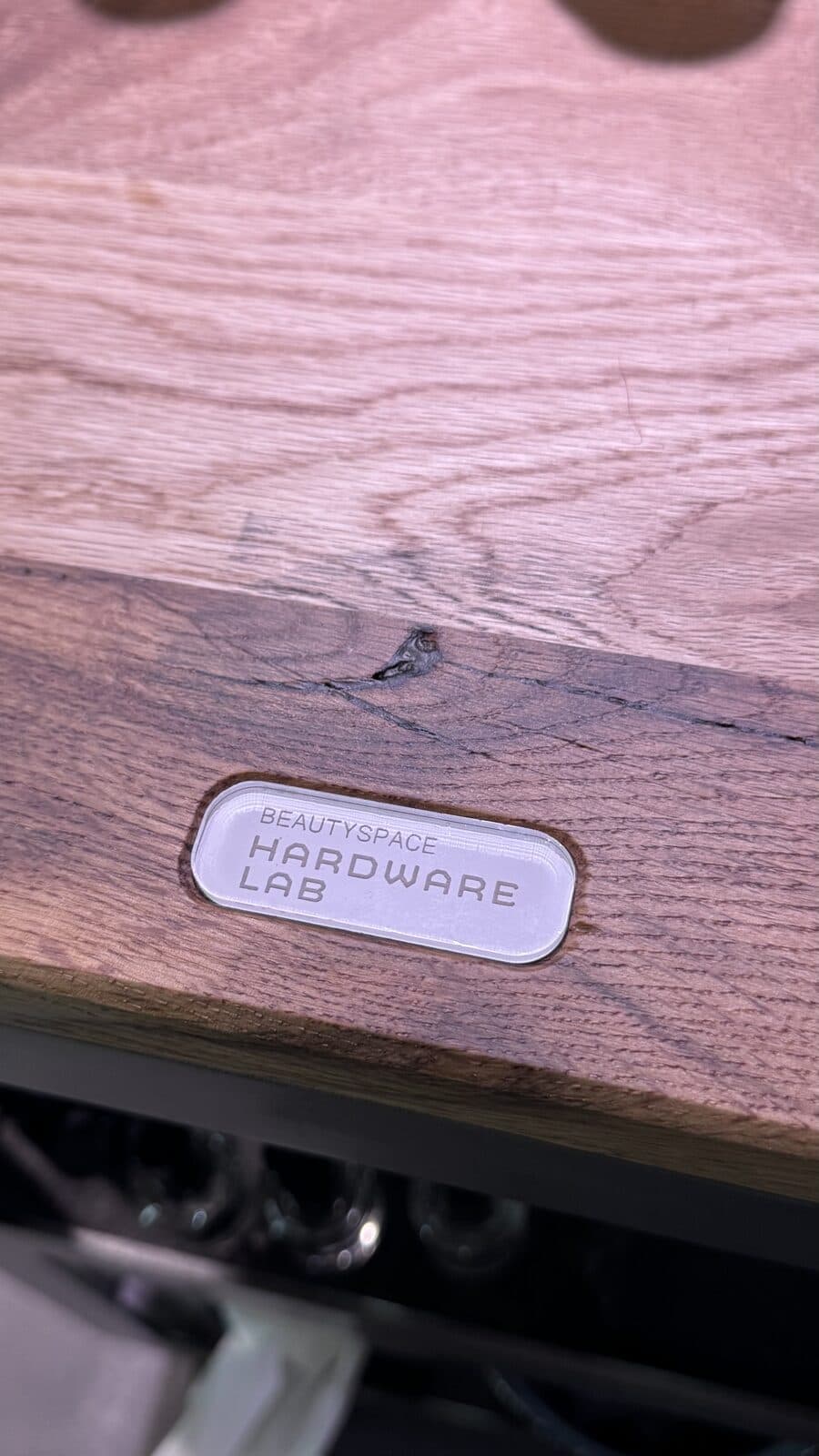 Hardware Lab plaque set into an oak top